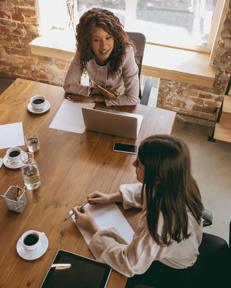 photo of two women in a discovery meeting