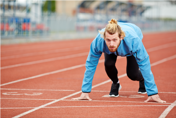 Photo of man at the starting line of a race